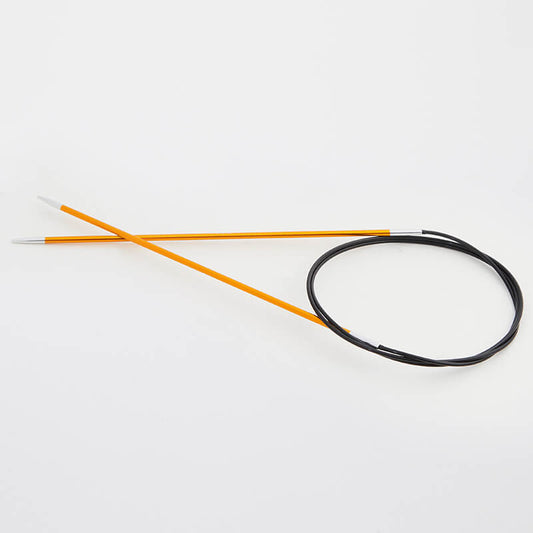 A pair of KnitPro Zing 16 inch circular knitting needles with red aluminum cords and black plastic tips on a white background.
